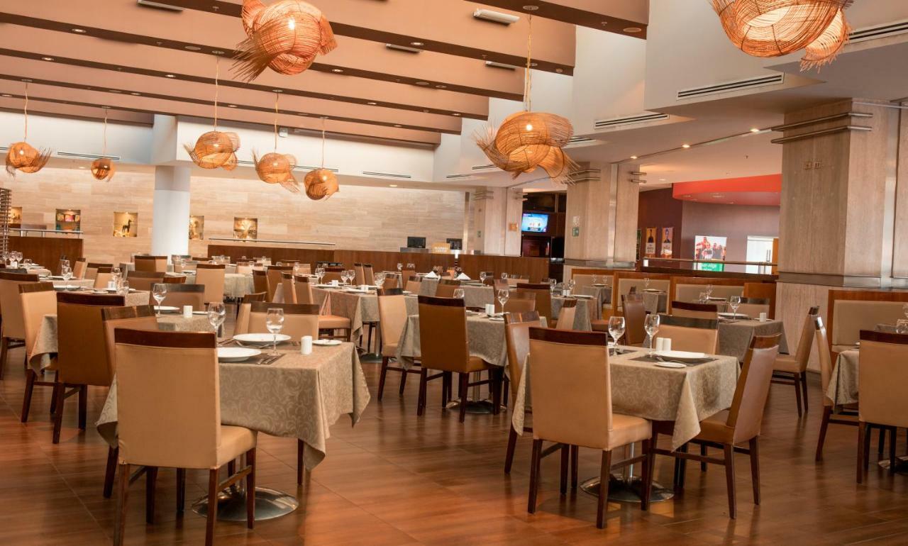 Mds Hotel Calama Bagian luar foto Restaurant in the hotel
