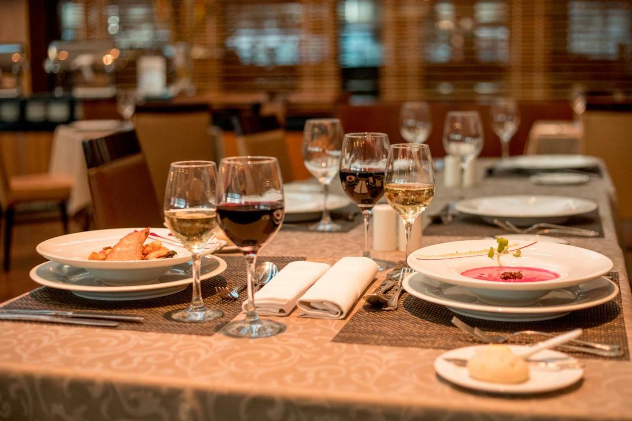 Mds Hotel Calama Bagian luar foto A table set for dinner