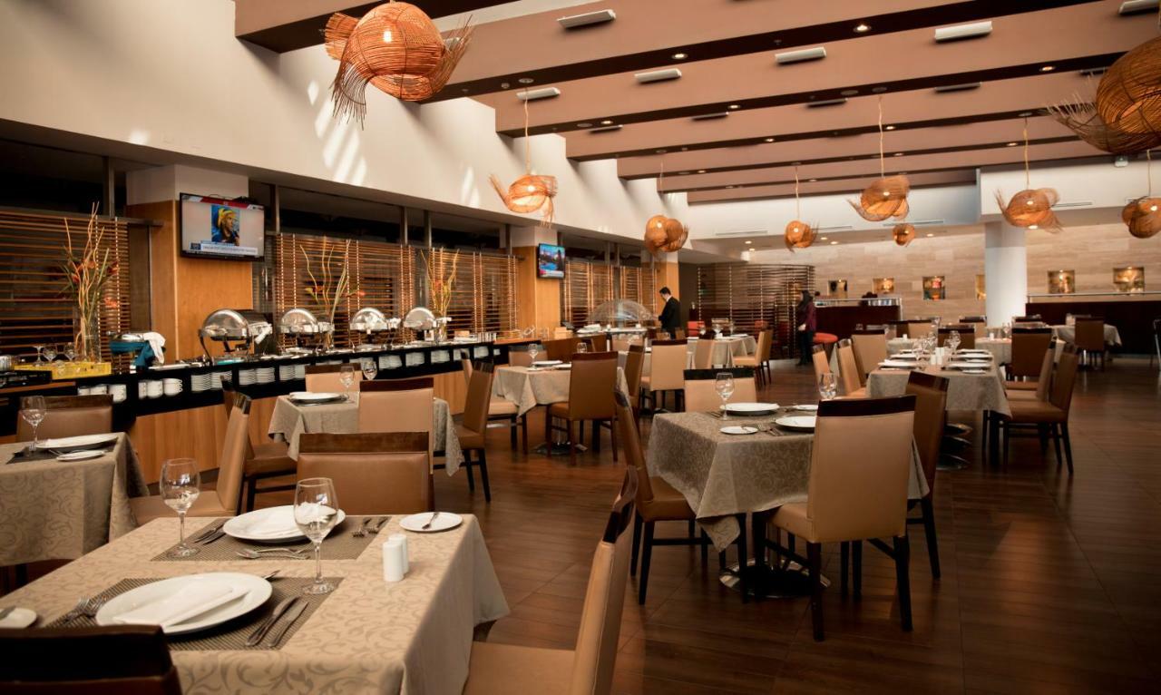 Mds Hotel Calama Bagian luar foto The interior of the restaurant