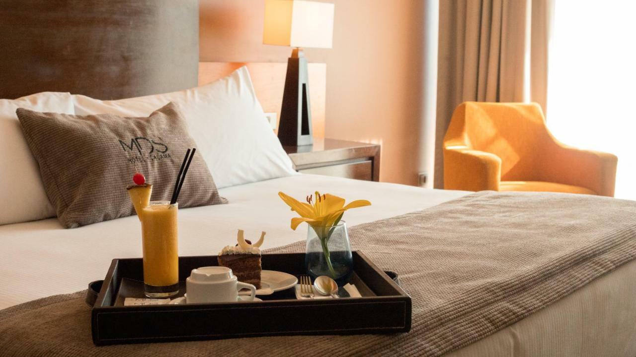 Mds Hotel Calama Bagian luar foto A room at the hotel