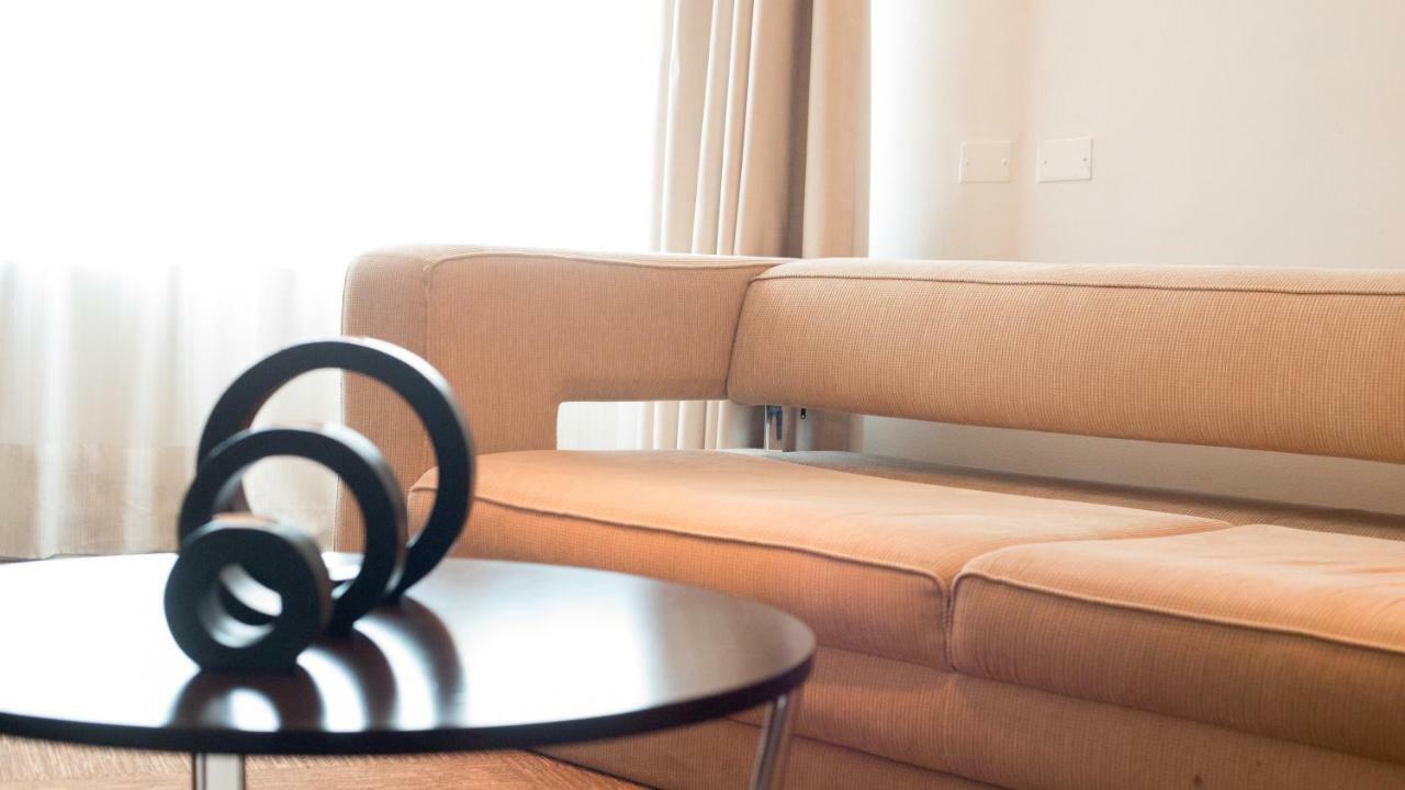 Mds Hotel Calama Bagian luar foto A sofa