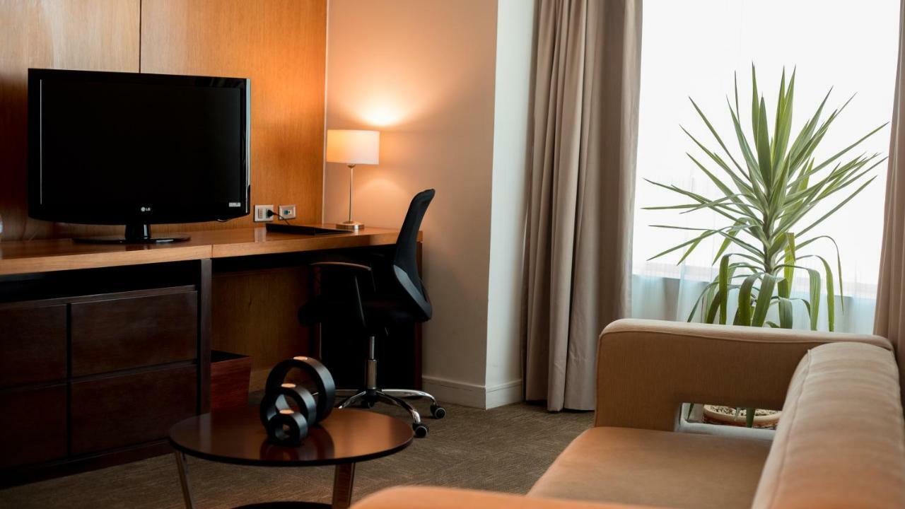 Mds Hotel Calama Bagian luar foto A room at the hotel