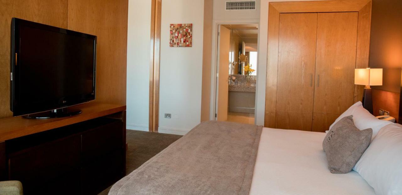 Mds Hotel Calama Bagian luar foto A bedroom at the hotel