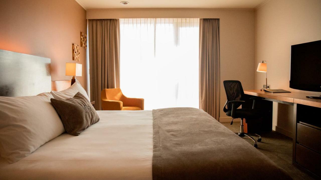 Mds Hotel Calama Bagian luar foto A room at the hotel