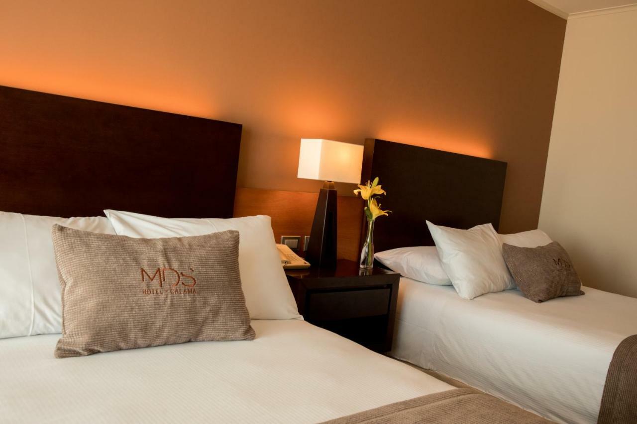 Mds Hotel Calama Bagian luar foto A room at the hotel