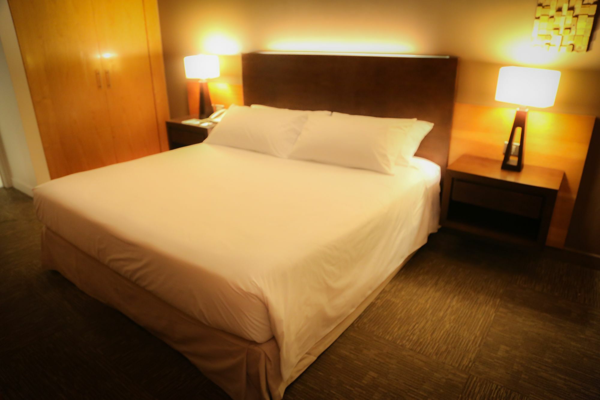 Mds Hotel Calama Bagian luar foto A king bed