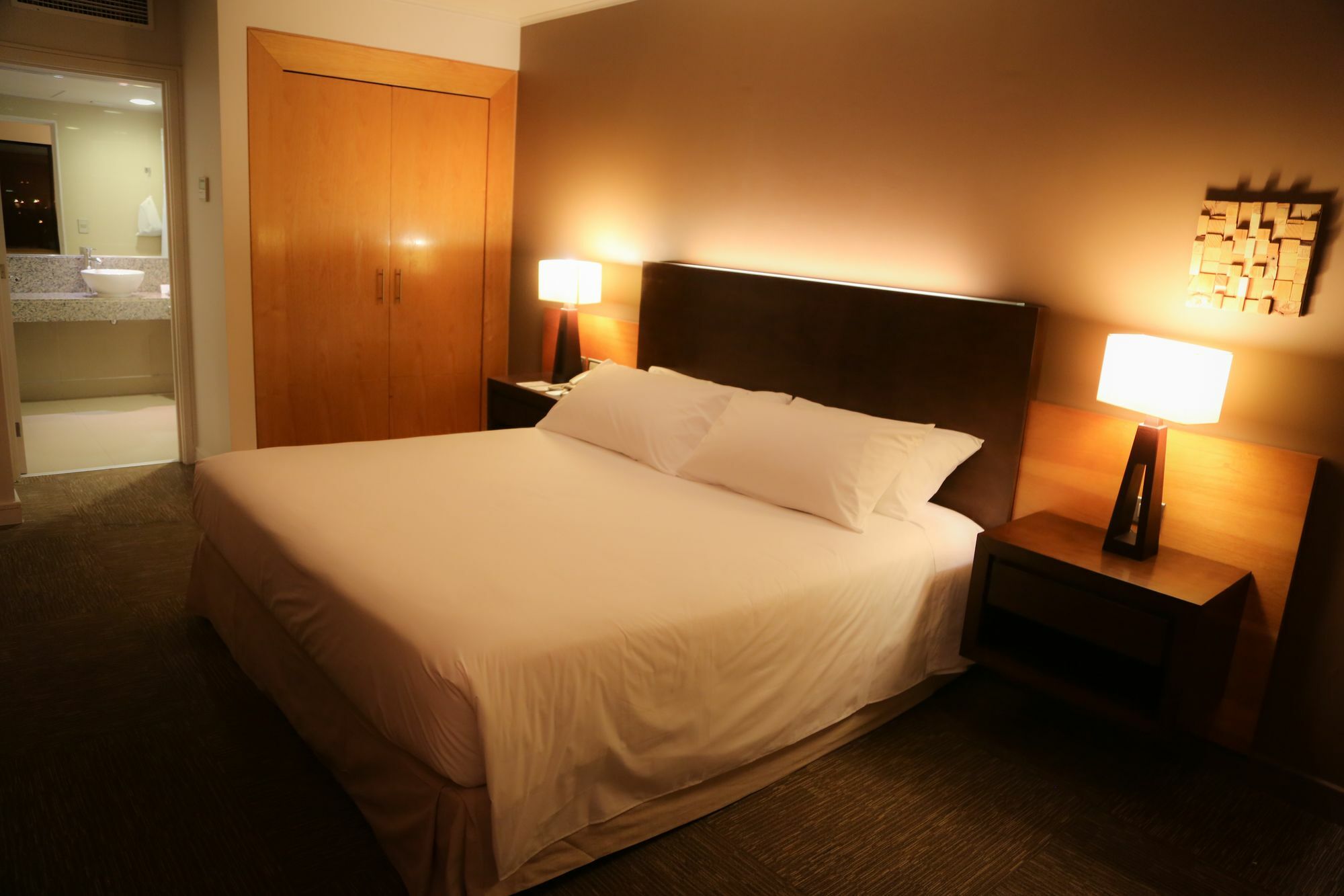 Mds Hotel Calama Bagian luar foto A bedroom