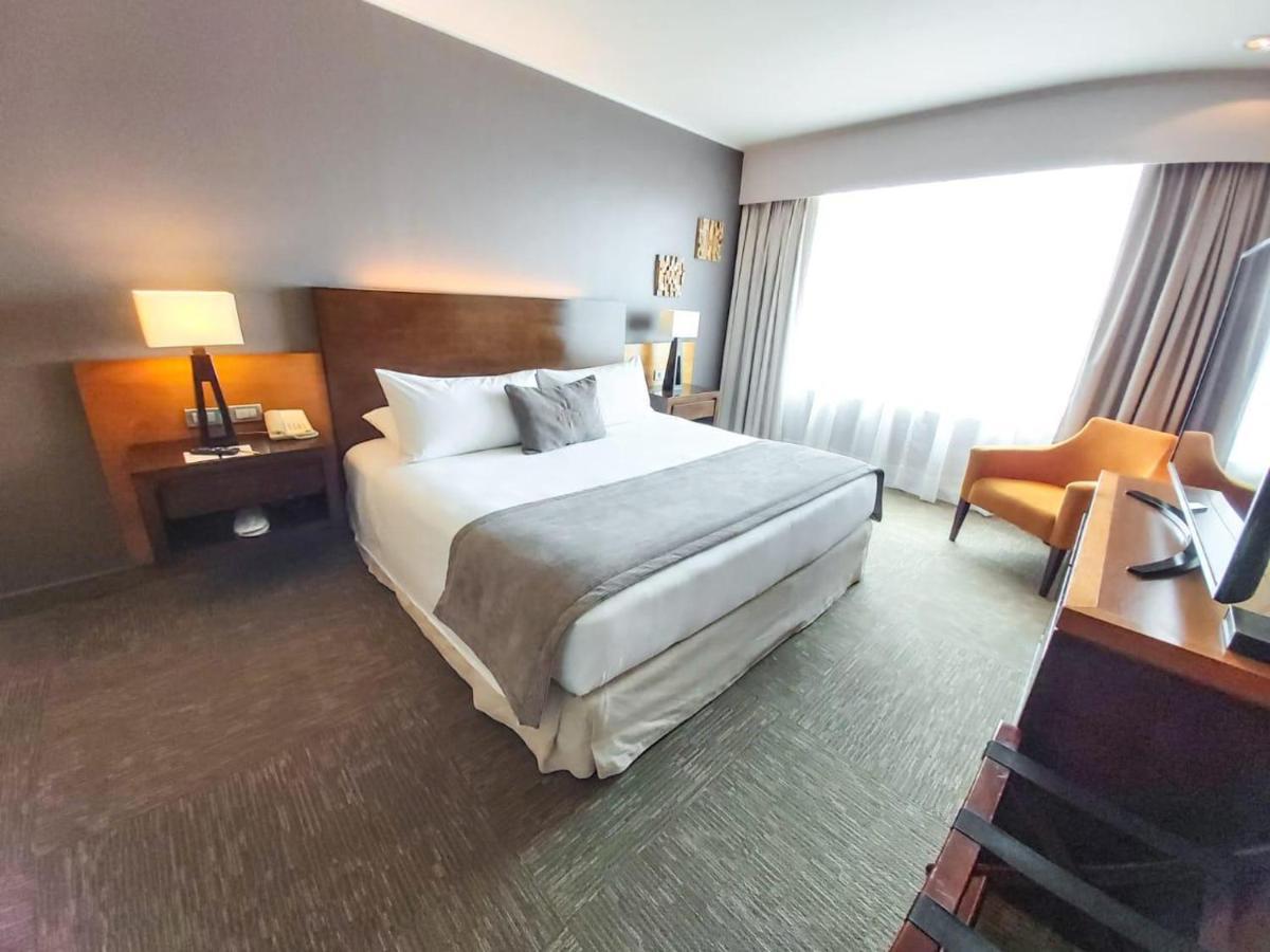 Mds Hotel Calama Bagian luar foto A room at the hotel